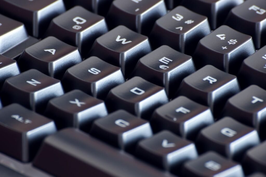 how to screenshot on hp laptop — close-up of laptop keyboard keys