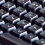 how to screenshot on hp laptop — close-up of laptop keyboard keys
