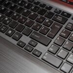 laptop keyboard types wrong characters close-up of laptop keyboard